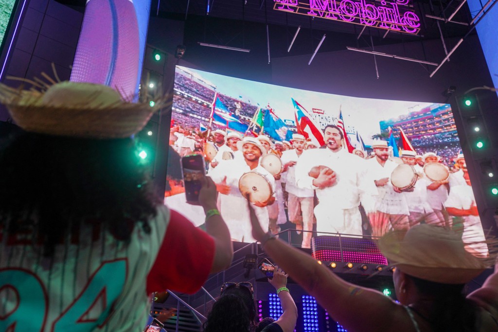 Fans react to the Bad Bunny halftime show during a Super Bowl viewing party in San Juan, Puerto Rico, on Sunday, February 8, 2026. (Photo by Jaydee Lee SERRANO / AFP)