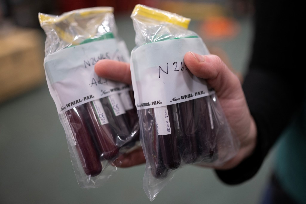 Photo by OLIVIER MORIN / AFP  This photograph shows blood samples of polar bears in eastern Spitzbergen, in the Svalbard archipelago, on April 9, 2025.
