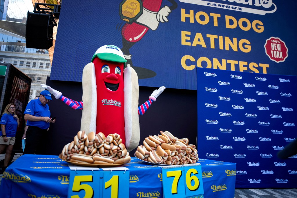 Frankie, the mascot for Nathan's Famous hot dogs, excites the audience at the official weigh-in ceremony, ahead of the Coney Island's 2025 Nathan's Famous Fourth of July International Hot Dog Eating Contest in New York City, U.S., July 3, 2025. REUTERS