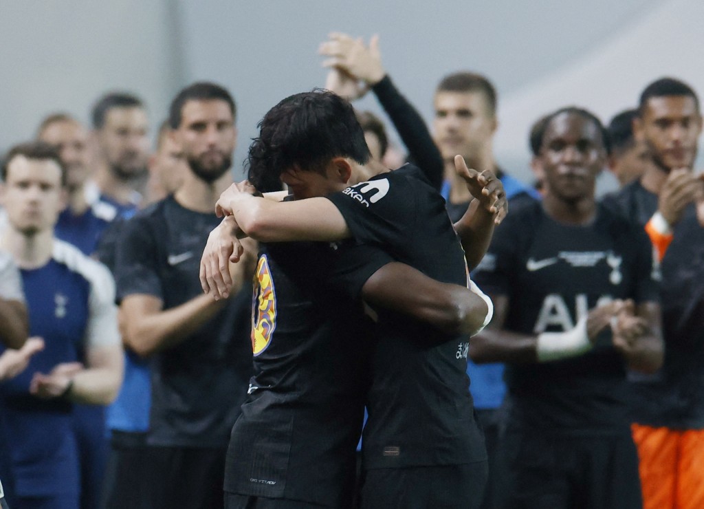 Tottenham Hotspur's Mohammed Kudus embraces Son Heung-Min after coming on as a substitute to replace him in his final game for Tottenham Hotspur. (Reuters)