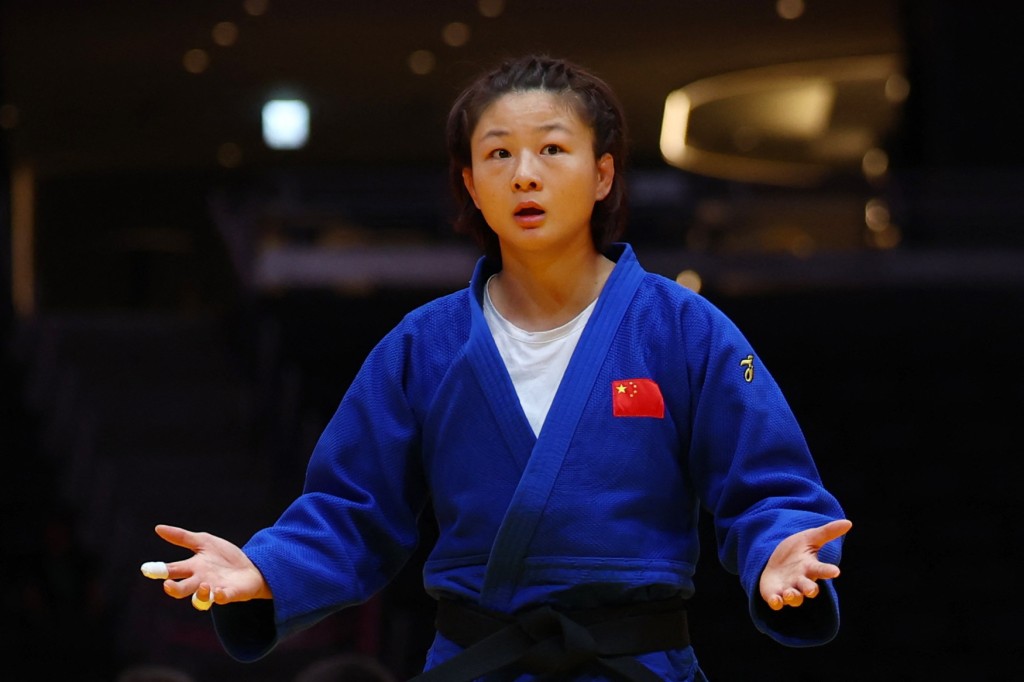 Asian Games - Aichi-Nagoya 2026 - Judo - Women - 70Kg - Quarterfinals - Aichi International Arena, Nagoya, Japan - October 1, 2026 China's Tang Jing reacts during her match against Japan's Rin Maeda REUTERS/Edgar Su