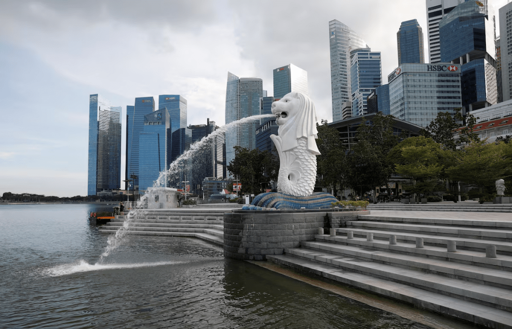 A water feature is seen in an empty Merlion Park, as tourism braces for a steep decline following the outbreak of coronavirus disease (COVID-19) along Marina Bay in Singapore, March 26, 2020. REUTERS/Edgar Su
