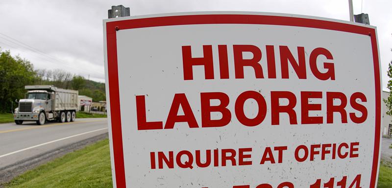 A hiring sign outside a concrete products company in Evans City, Pennsylvania, on May 5, 2021. A hiring sign outside a concrete products company in Evans City, Pennsylvania, on May 5, 2021.