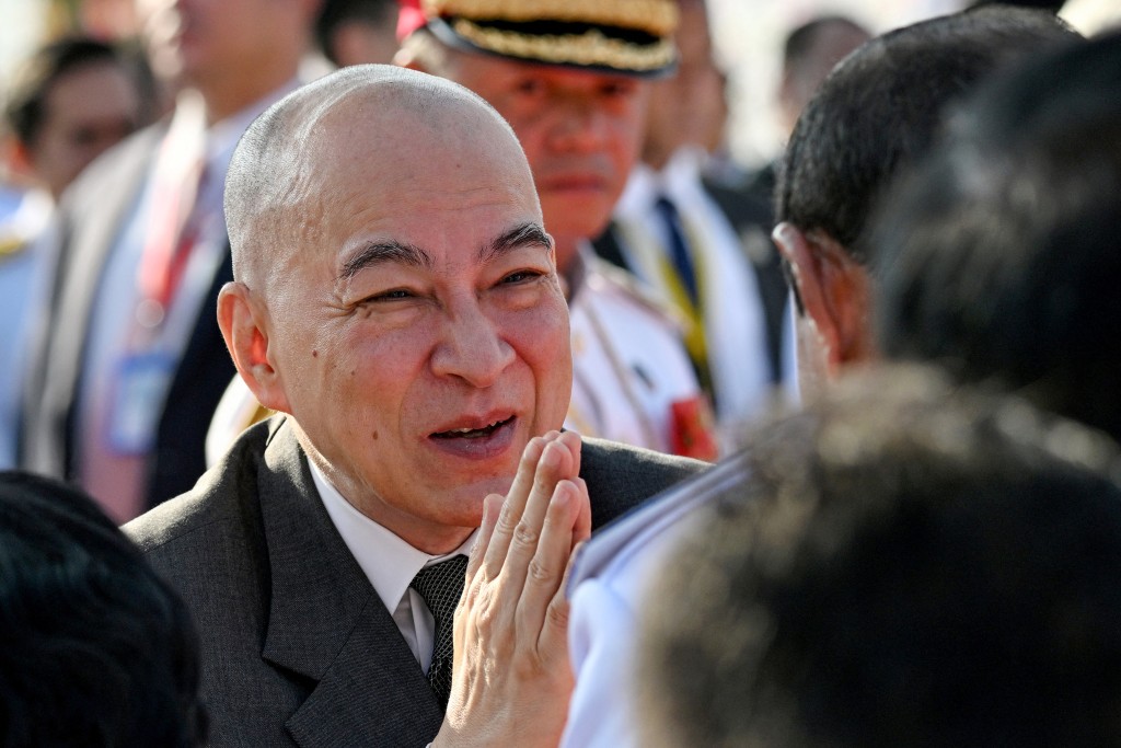 Photo by TANG CHHIN SOTHY / AFP  Cambodia's King Norodom Sihamoni greets government officials during a ceremony marking Cambodia's 72nd Independence Day celebrations at the Independence Monument in Phnom Penh on November 9, 2025.