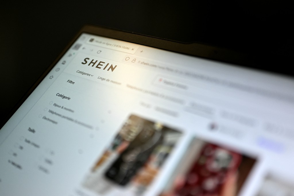 Photo by JULIE SEBADELHA / AFP  This photograph shows the Asian e-commerce giant Shein website page on a laptop in Paris on November 5, 2025.