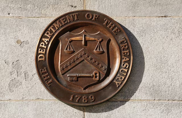 A bronze seal for the Department of the Treasury is shown at the U.S. Treasury building in Washington, U.S., January 20, 2023.  REUTERS/Kevin Lamarque 