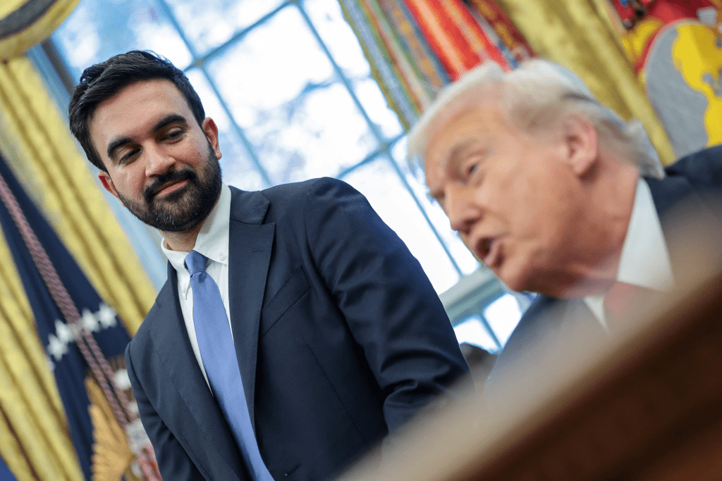 Trump and Mamdani speak to members of the media as they meet in the Oval Office at the White House in Washington, D.C., U.S., November 21, 2025. REUTERS/Jonathan Ernst