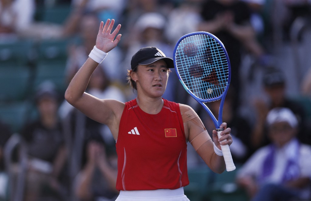 Asian Games - Aichi-Nagoya 2026 - Tennis - Higashiyama Park Tennis Center, Nagoya, Japan - October 2, 2026 China's Wang Xiyu celebrates after winning the women's final against China's Zhang Shuai REUTERS/Andrew Couldridge