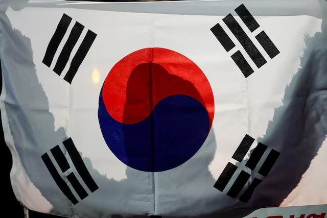 South Korean flag in front of the National Assembly in Seoul, South Korea, December 6, 2024. (Reuters)