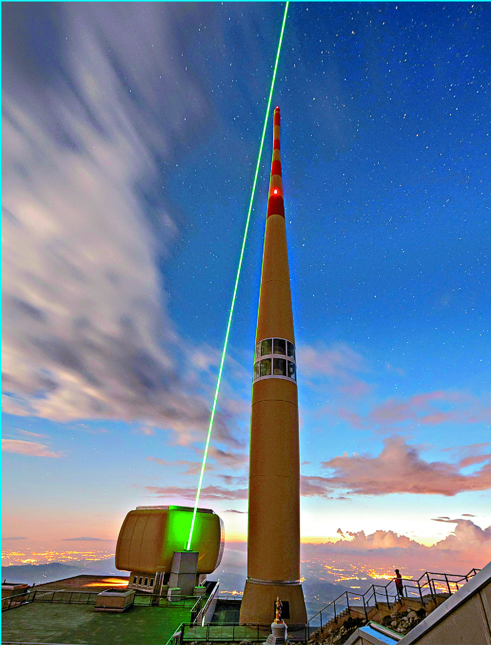 Scientists use a laser beam to guide a lightning bolt for more than 50 meters at the peak of the Santis mountain in northeastern Switzerland. REUTERS Scientists use a laser beam to guide a lightning bolt for more than 50 meters at the peak of the Santis mountain in northeastern Switzerland. REUTERS