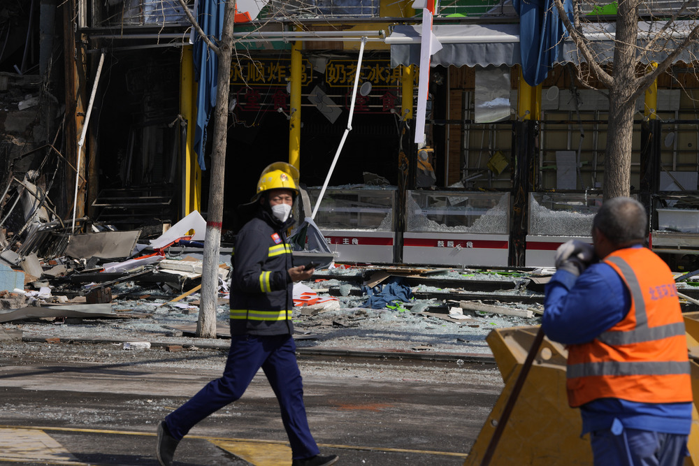 The blast, suspected to have been caused by a gas leak at a fried chicken restaurant, destroyed shops and buildings. AP The blast, suspected to have been caused by a gas leak at a fried chicken restaurant, destroyed shops and buildings. AP
