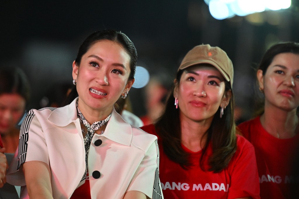 Former Prime Minister Paetongtarn Shinawatra attends a major rally event. AP