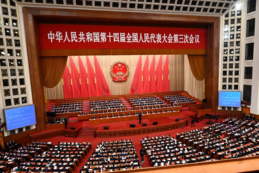 A general view as delegates attend the closing session of the National People's Congress (NPC) at the Great Hall of the People in Beijing on March 11, 2025. (AFP)