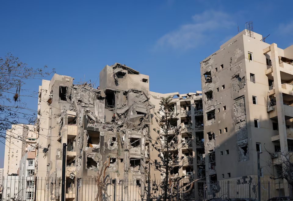 Emergency personnel work at an impacted residential site, following a missile attack from Iran on Israel, amid the Israel-Iran conflict, in Be'er Sheva, Israel June 24, 2025. (REUTERS/Amir Cohen)
