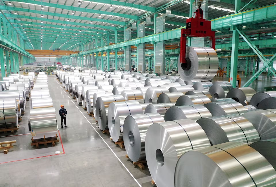 A drone view shows an employee working on the production line of aluminium products at a factory in Huaibei, Anhui province, China February 11, 2025. China Daily via REUTERS/File Photo 