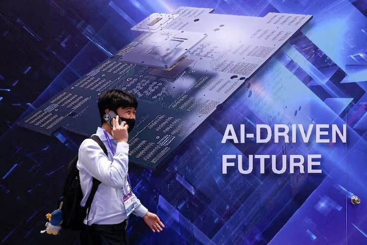 A visitor walks past a display reading "AI-DRIVEN FUTURE" during SEMICON Taiwan in Taipei, Taiwan, September 2, 2026. REUTERS/Ann Wang/File Photo