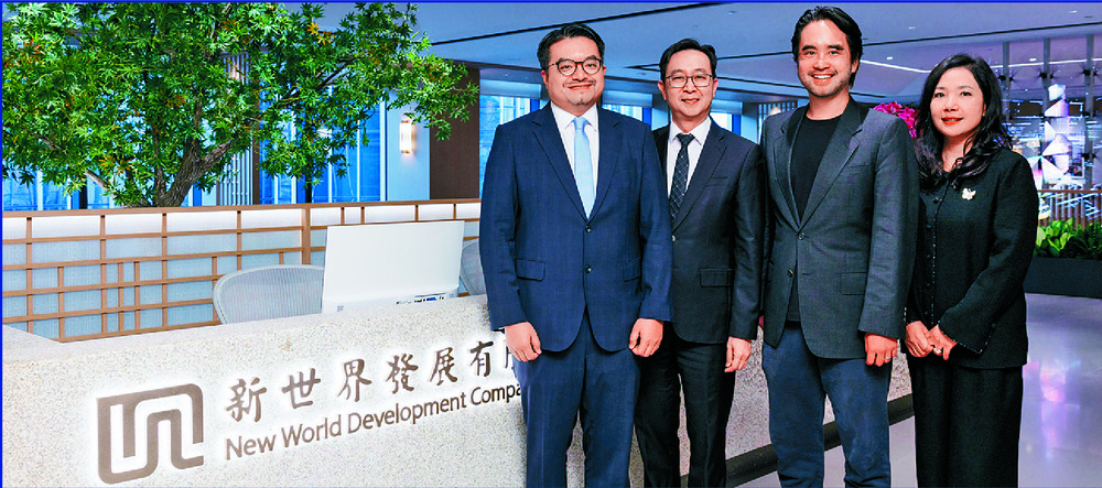 All smiles in a photo from New World are, from near right, CFO Edward Lau, new CEO Eric Ma, nonexecutive vice chairman Adrian Cheng and Echo Huang, CEO of New World China Land. All smiles in a photo from New World are, from near right, CFO Edward Lau, new CEO Eric Ma, nonexecutive vice chairman Adrian Cheng and Echo Huang, CEO of New World China Land.