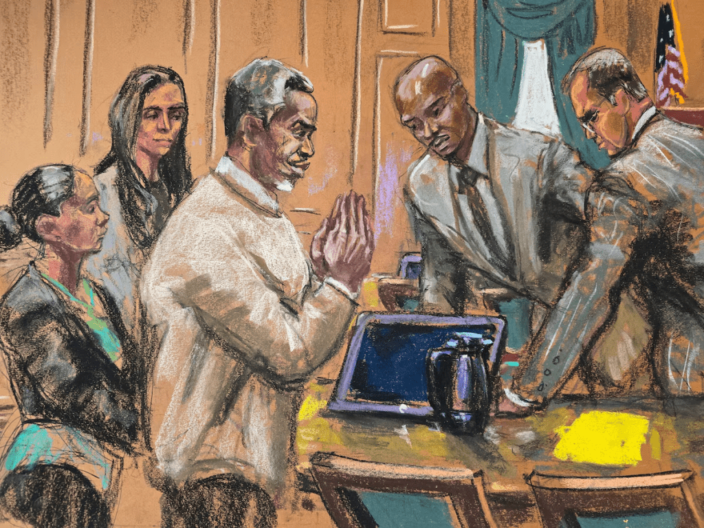 Sean "Diddy" Combs gestures as he speaks with his defense team before the day's session of his sex trafficking trial in New York City, New York, U.S., June 18, 2025 in this courtroom sketch. REUTERS/Jane Rosenberg/File Photo 