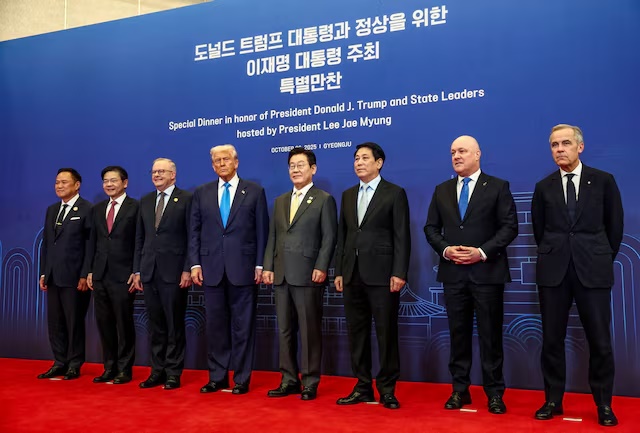 U.S.President Donald Trump,Canadian Prime Minister Mark Carney, Australian Prime Minister Anthony Albanese, South Korean President Lee Jae Myung, Singapore's Prime Minister Lawrence Wong, Thailand Prime Minister Anutin Charnvirakul, Vietnam's President Luong Cuong and New Zealand's Prime Minister Christopher Luxon pose for a family photo, on the day of an Asia-Pacific Economic Cooperation (APEC) leaders' dinner hosted by South Korean President Lee Jae Myung in Gyeongju, South Korea, October 29, 2025.REUTERS
