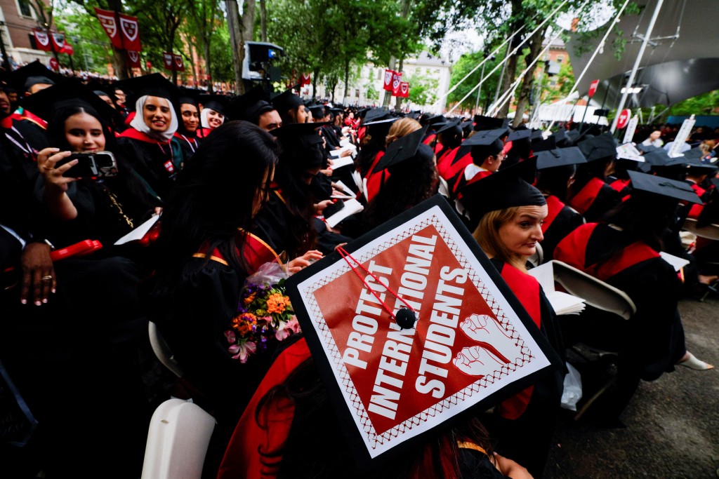 A graduating student wears their hat, decorated with a statement of support for international students, during the 374th Commencement exercises at Harvard University in Cambridge, Massachusetts, U.S., May 29, 2025. (Reuters)