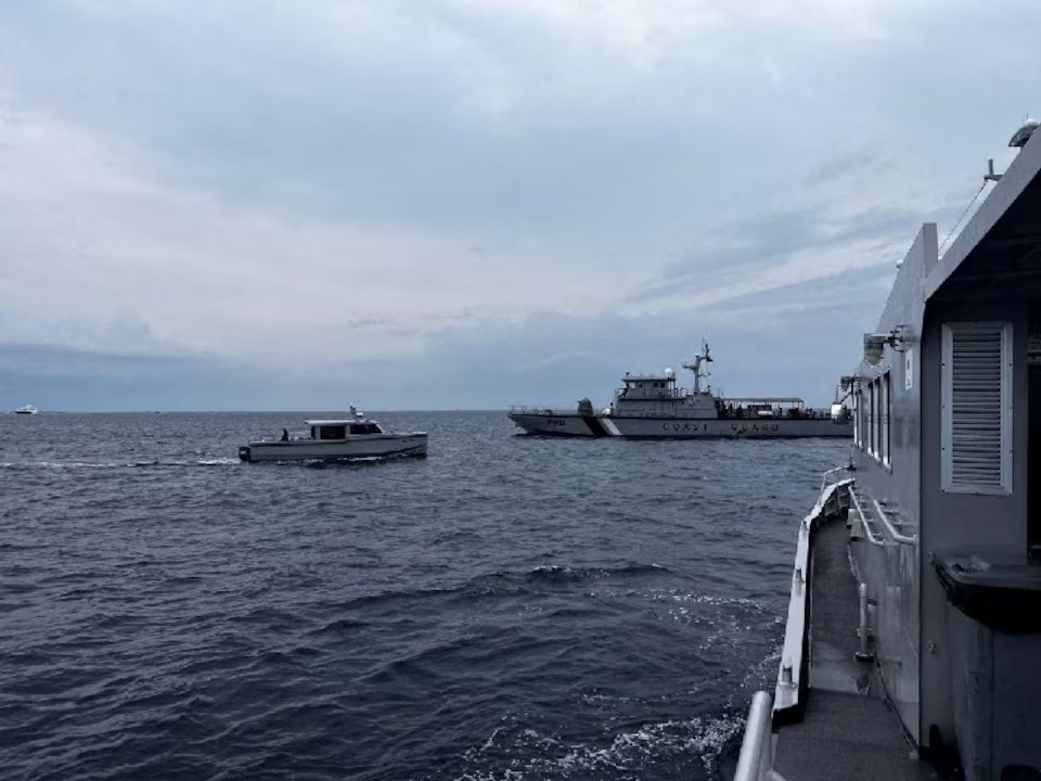 Coast Guard boats are deployed to search for four Italian scuba divers near Alimatha Island, Vaavu Atoll, Maldives, in this handout photo released on May 18, 2026. Maldives President's Office/ Handout via REUTERS
