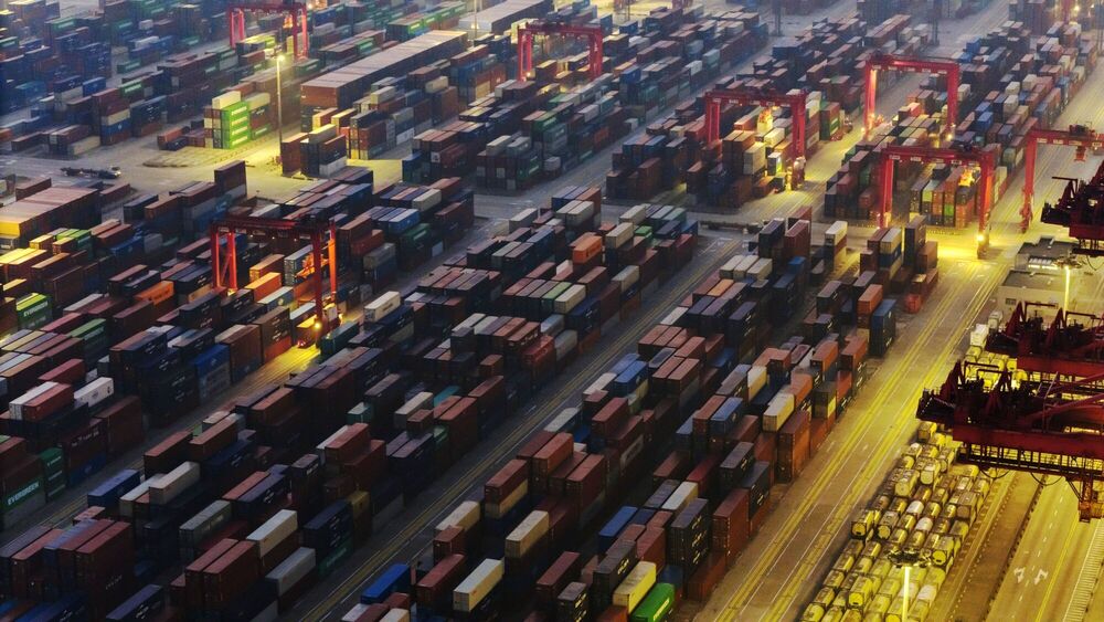 Gantry cranes and shipping containers at the Yangshan Deepwater Port in Shanghai, China, early on Monday, Jan. 20, 2025. Bloomberg Gantry cranes and shipping containers at the Yangshan Deepwater Port in Shanghai, China, early on Monday, Jan. 20, 2025. Bloomberg