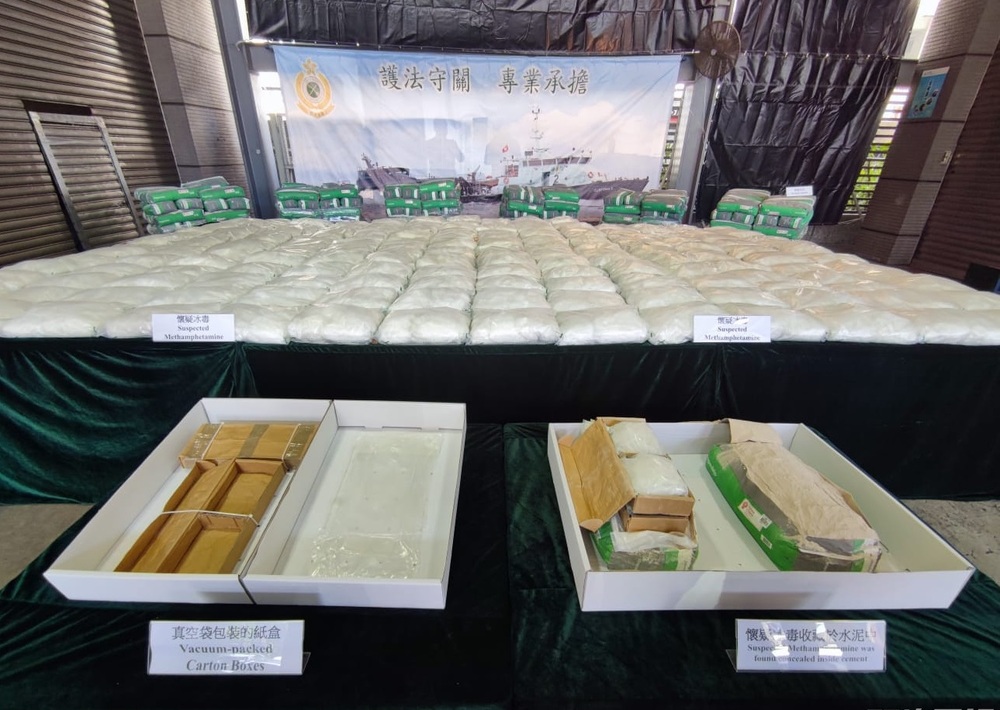 Two vacuum-packed cartons carrying about 500 grams of suspected 'ice' are hidden in each of 251 cement-loaded bags in the consignment. Two vacuum-packed cartons carrying about 500 grams of suspected 'ice' are hidden in each of 251 cement-loaded bags in the consignment.