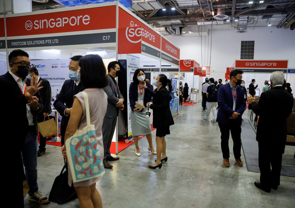Visitors attend the Restaurants Asia and Cafe Asia trade conventions in Singapore November 18, 2021. (Reuters) Visitors attend the Restaurants Asia and Cafe Asia trade conventions in Singapore November 18, 2021. (Reuters)
