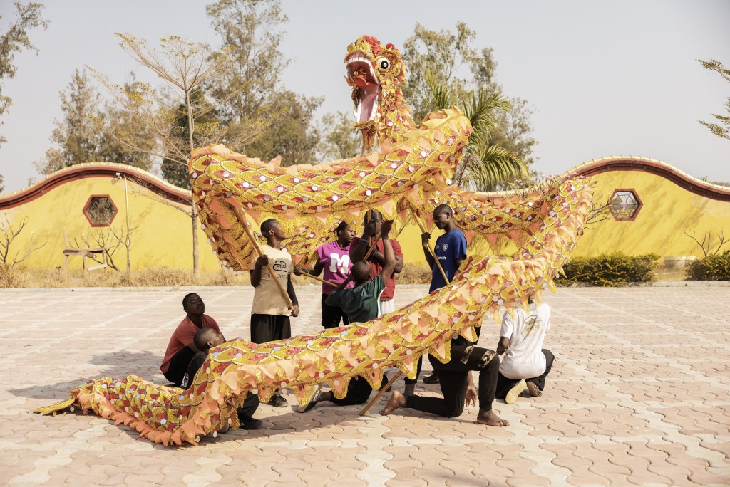 Photo by GIANLUIGI GUERCIA / AFP  Shaolin students train for Dragon Dance at a Shaolin Temple outside Lusaka on August 8, 2026.