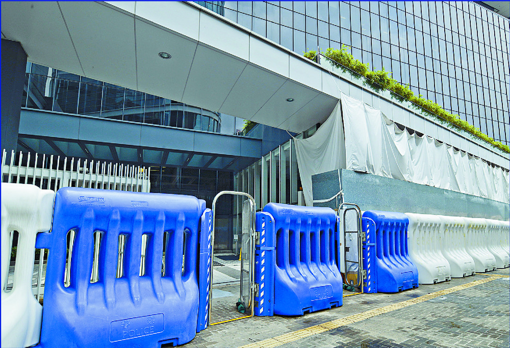 Water barriers are set up around the Legco complex. SING TAO Water barriers are set up around the Legco complex. SING TAO