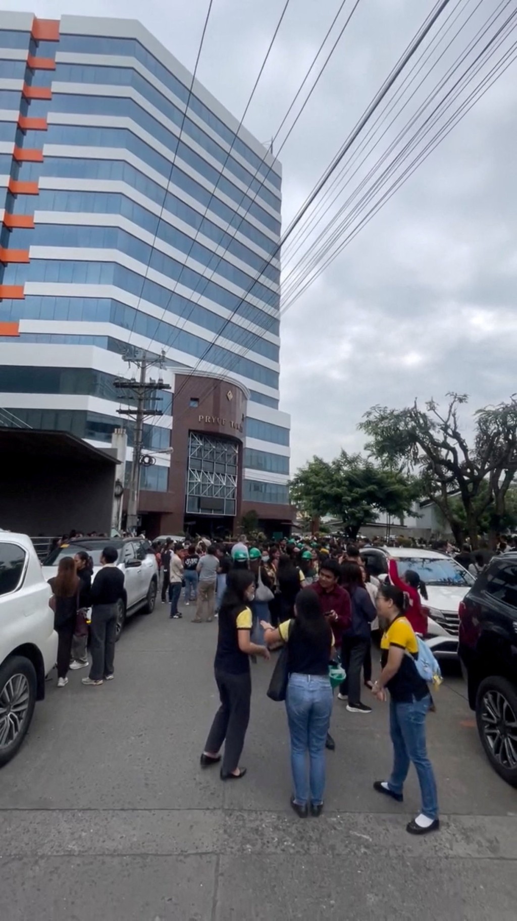 People gather in an open area following an earthquake of magnitude 7.5 that struck offshore in the southern Philippines, in Davao City, Mindanao, Philippines, October 10, 2025, in this screengrab obtained from a social media video. Francis Magbanua/via REUTERS