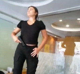 A screenshot from a video of Sali hafiz who held up a Beirut bank to access her sister's savings. (Twitter) A screenshot from a video of Sali hafiz who held up a Beirut bank to access her sister's savings. (Twitter)