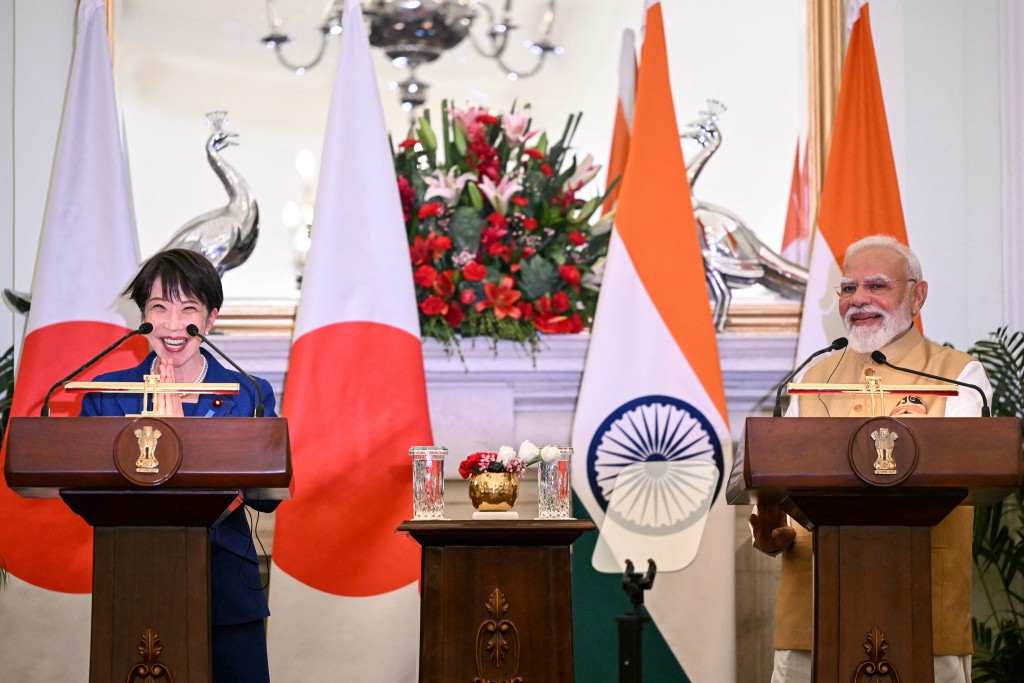 Japan's Prime Minister Sanae Takaichi (L) gestures as India's Prime Minister Narendra Modi looks on during joint press statements after their meeting at the Hyderabad House in New Delhi on July 2, 2026. (Photo by Sajjad HUSSAIN / AFP)