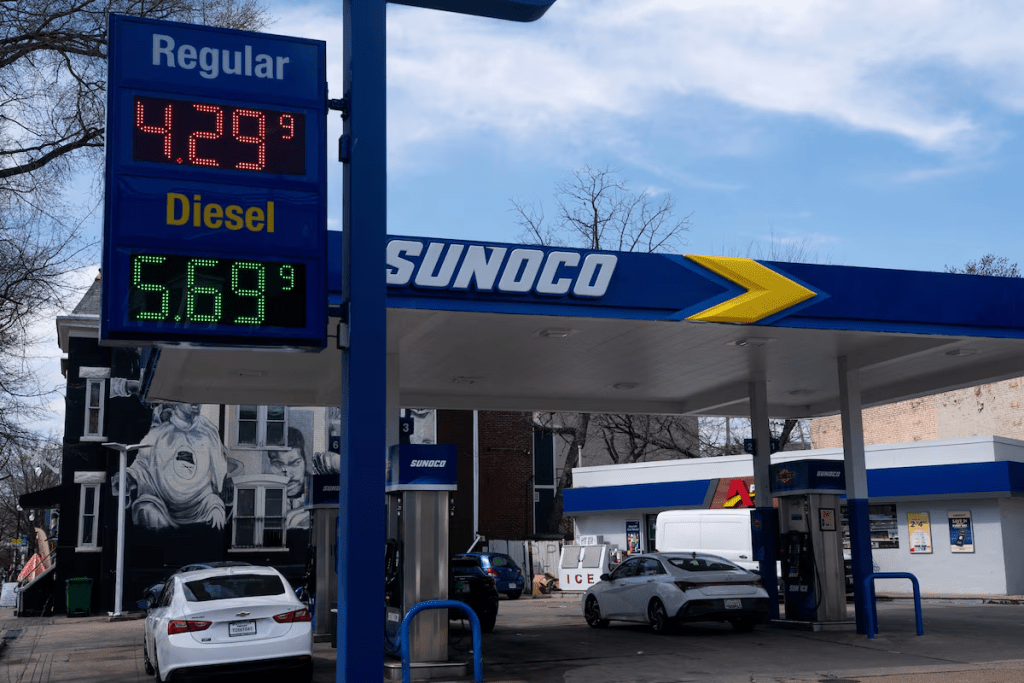 Prices are seen at a gas station on Capitol Hill amid the U.S.-Israeli war with Iran, in Washington, D.C., U.S., March 19, 2026. REUTERS/Nathan Howard