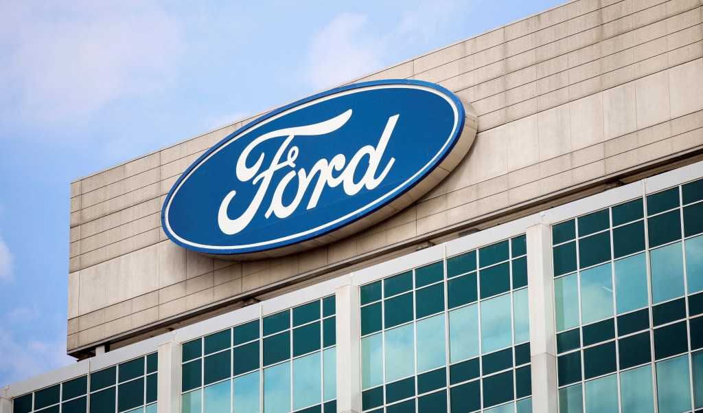 A Ford logo is seen on the Ford Motor World headquarters in Dearborn, Michigan, U.S., March 12, 2025. REUTERS