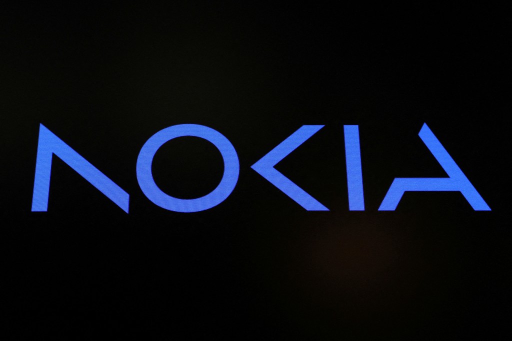 A screen displays the company logo for Nokia Corporation on the floor of the New York Stock Exchange (NYSE) in New York City, U.S., May 24, 2023.  REUTERS/Brendan McDermid