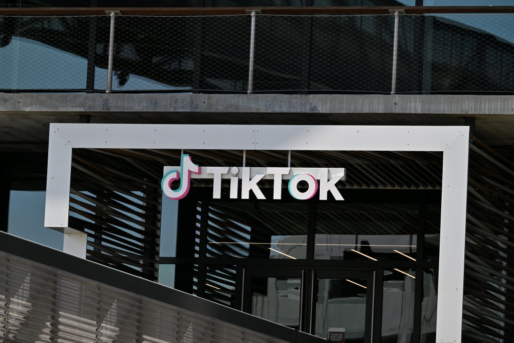 The TikTok logo is seen outside the Chinese video app company’s Los Angeles offices on April 4, 2025 in Culver City, California. China said on September 26, 2025 it hoped the United States would provide "open and fair" treatment for TikTok and other Chinese companies investing in the country, after President Donald Trump signed an executive order on a proposed deal for a US version of the popular app. (Photo by Robyn Beck / AFP)