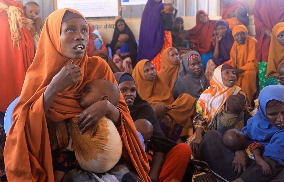 Fadumo Isaq Abdi, an internally displaced Somali woman, holds her child Maria Mohamed Ali at the feeding center, a new site for IDPs, in Barwaaqo, near Baidoa, Somalia. (Reuters) Fadumo Isaq Abdi, an internally displaced Somali woman, holds her child Maria Mohamed Ali at the feeding center, a new site for IDPs, in Barwaaqo, near Baidoa, Somalia. (Reuters)