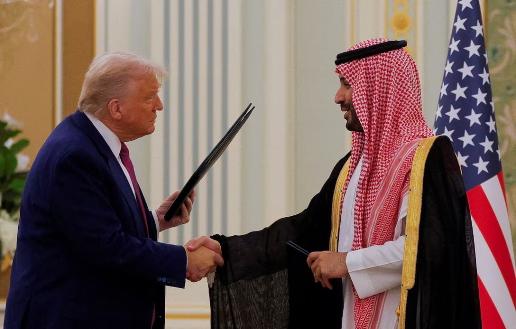 U.S. President Donald Trump and Saudi Crown Prince and Prime Minister Mohammed Bin Salman shake hands during a Memorandum of Understanding (MOU) signing ceremony at the Royal Court in Riyadh, Saudi Arabia, May 13, 2025. (Reuters)