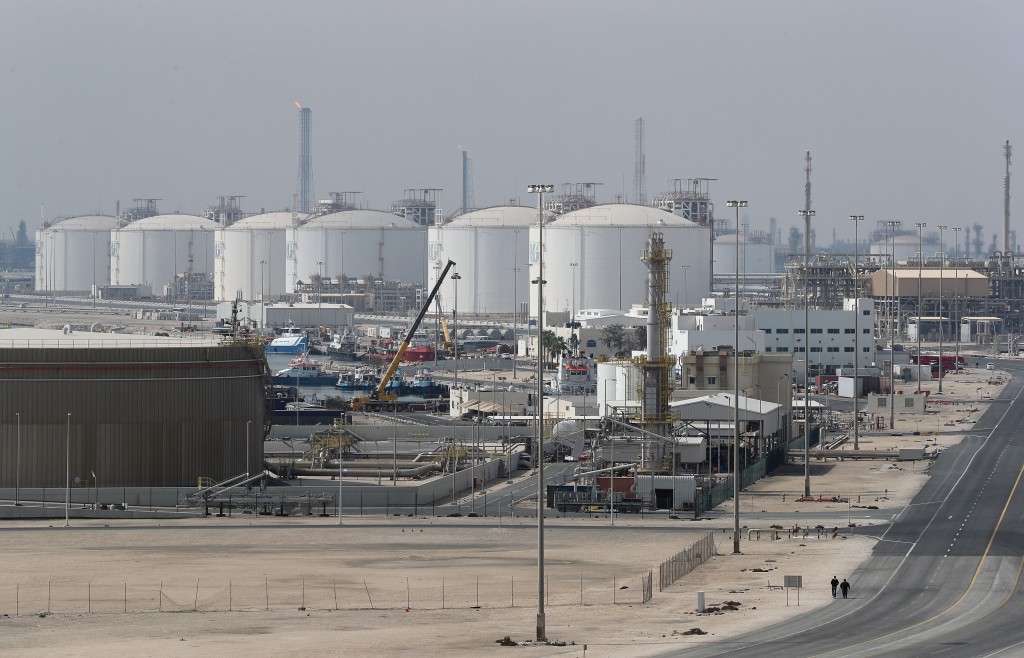 Photo by KARIM JAAFAR / AFP  This picture shows the Ras Laffan Industrial City, Qatar's principal site for production of liquefied natural gas and gas-to-liquid, administrated by Qatar Petroleum, some 80 kilometers (50 miles) north of the capital Doha, on February 6, 2017.