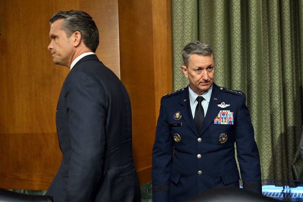 Photo by ALEX WROBLEWSKI / AFP  US Defense Secretary Pete Hegseth (L) and the Chairman of the Joint Chiefs of Staff Gen.
