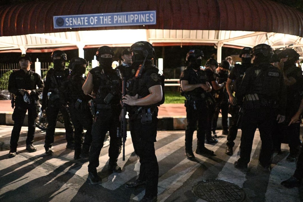 SWAT members stand outside the Philippine Senate, which holds Senator Ronald "Bato" dela Rosa, the chief enforcer of former President Rodrigo Duterte's drug war, in protective custody amid an International Criminal Court warrant, Pasay City, Metro Manila, Philippines, May 13, 2026. REUTERS/Noel Celis 