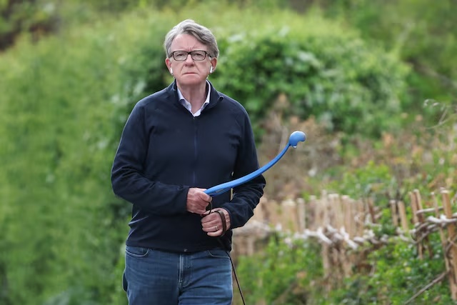 Former British ambassador to the U.S. Peter Mandelson walks outside his residence, on the day that Britain's Prime Minister Keir Starmer is expected to make a statement on the vetting process for Peter Mandelson's appointment as British Ambassador to the United States, in London, Britain, April 20, 2026. REUTERS/Toby Melville