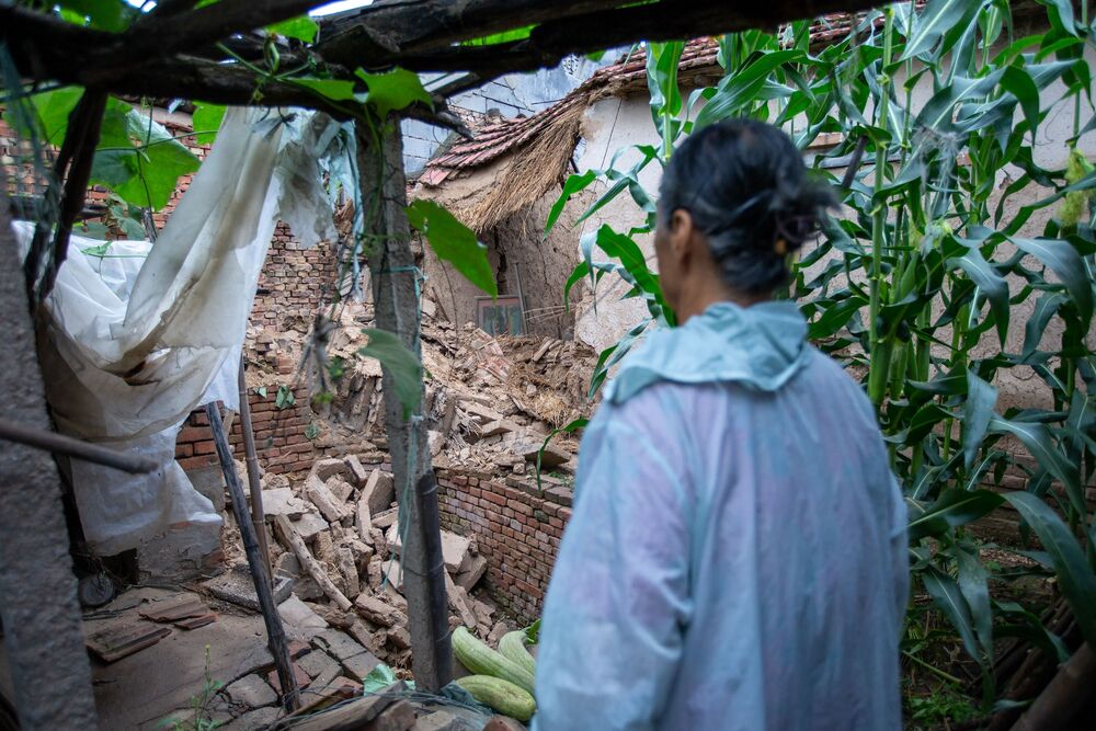 Collapsed brick walls and roofs of houses lay in Pingyuan county in Shandong province, where people gather in the streets during the tremor. AFP Collapsed brick walls and roofs of houses lay in Pingyuan county in Shandong province, where people gather in the streets during the tremor. AFP
