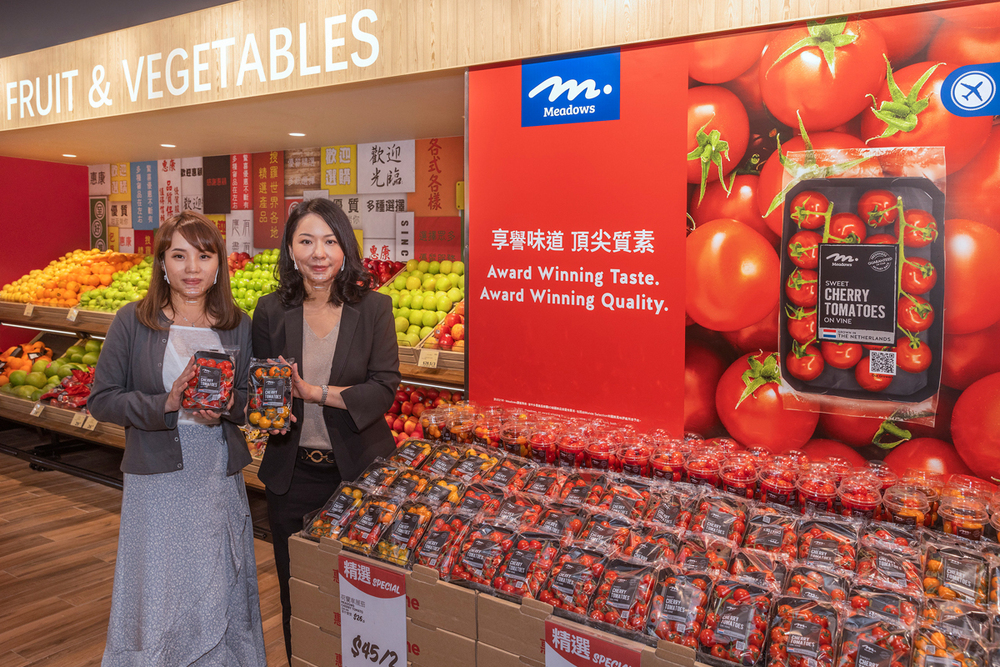 Yvonne Lee (right) and Zita Kwok introduce premium cherry tomato sourced from the Netherlands.