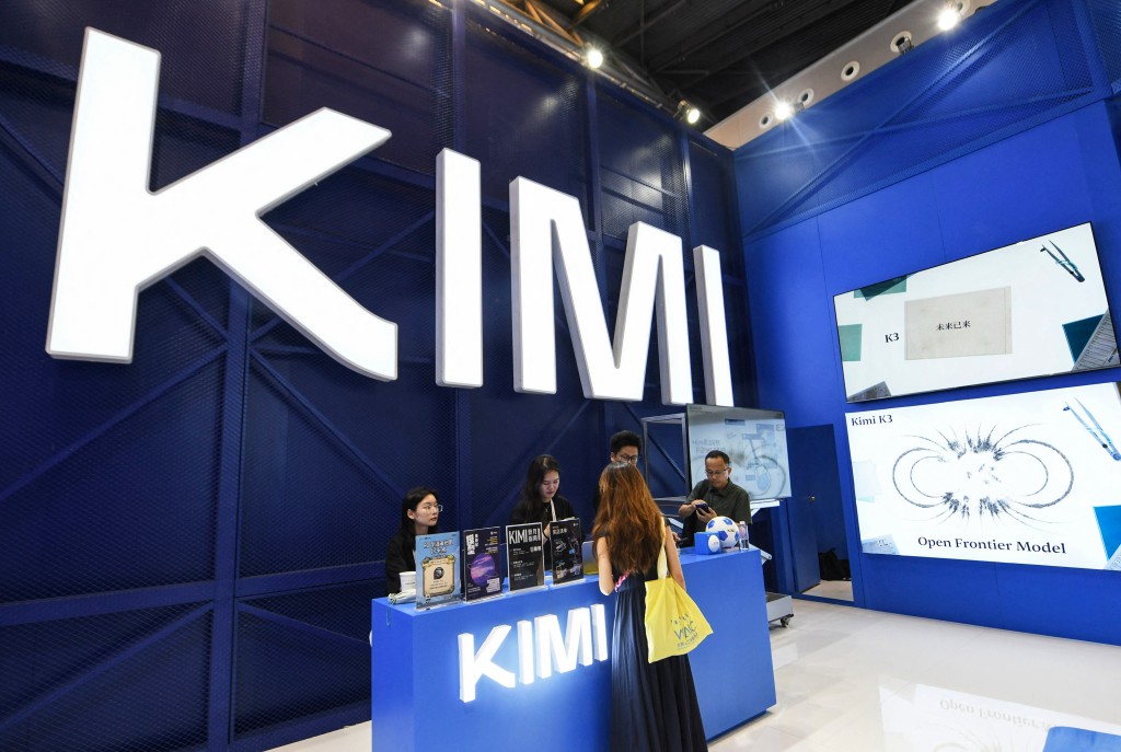 Photo by - / CN-STR / AFP. People visit the Moonshot AI stand, featuring Kimi K3, during the World Artificial Intelligence Conference (WAIC) in Shanghai on July 17, 2026.