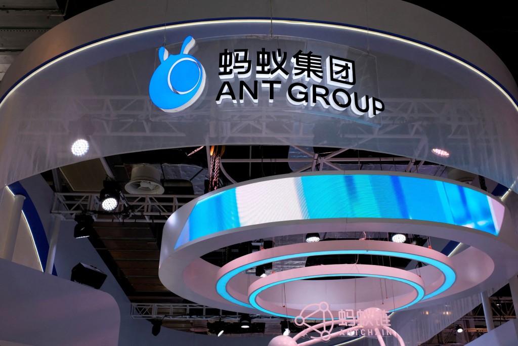 A sign of Antchain, the blockchain technology branch under Ant Group, is seen at Ant Group's booth during the World Artificial Intelligence Conference (WAIC) in Shanghai, China, July 8, 2021. REUTERS