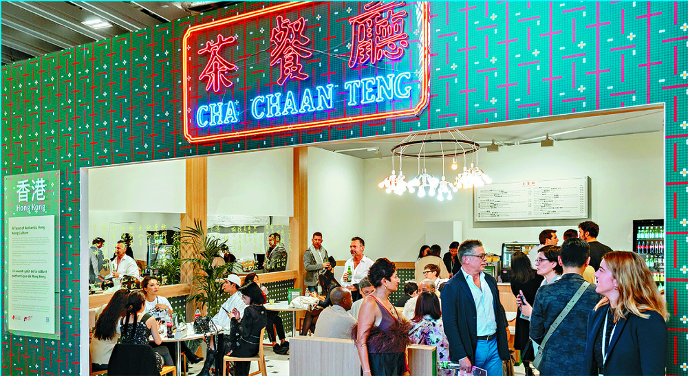 The Grand Palais was the setting for Art Basel Paris, which featured a cha chaan teng and talks by HKTB officials. Dane Cheng, far right, and Art Basel's  Noah Horowitz enjoy the delicacies. HKTB