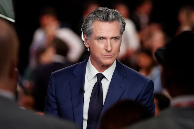 California Governor Gavin Newsom (D) reacts as he speaks to the members of the press on the day of the first presidential debate hosted by CNN in Atlanta, Georgia, U.S., June 27, 2024. REUTERS/Marco Bello/File Photo 