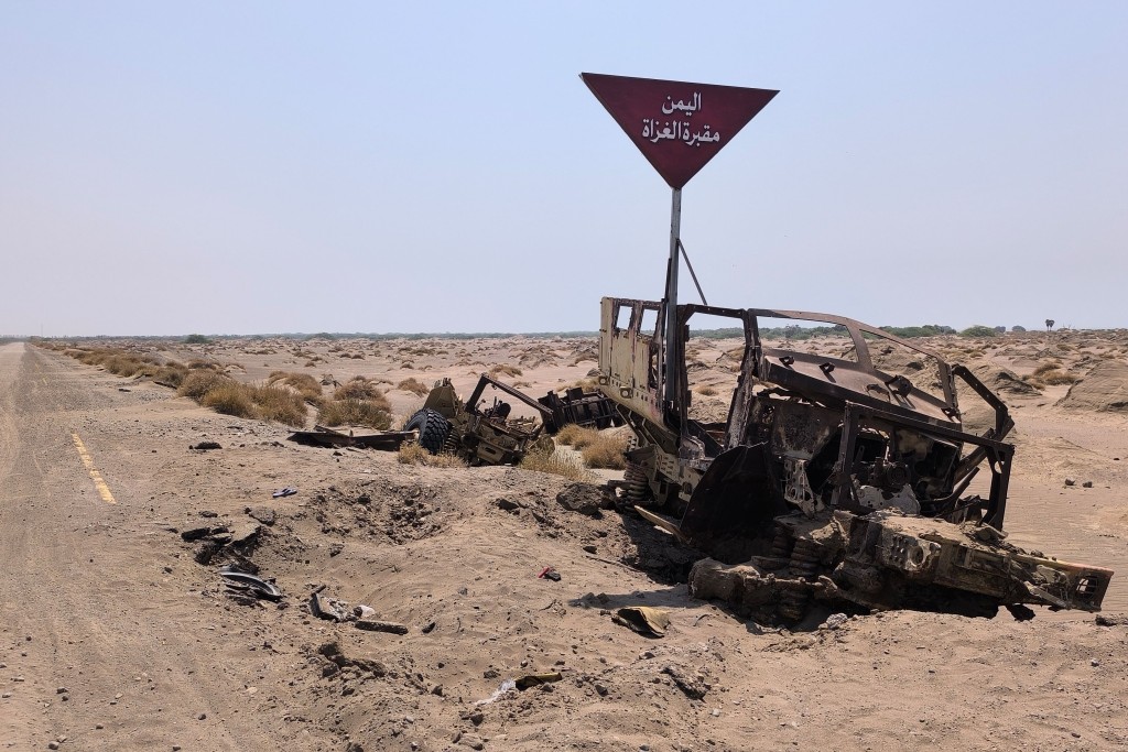 Destroyed military vehicles reportedly belonging to Saudi-backed forces following fighting with Houthis. (AFP)